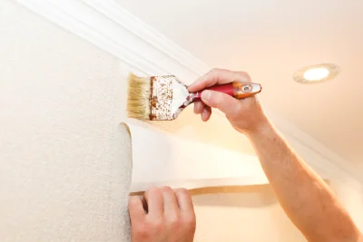 Pose de papier peint à Issendolus — revêtements muraux et toiles de verre